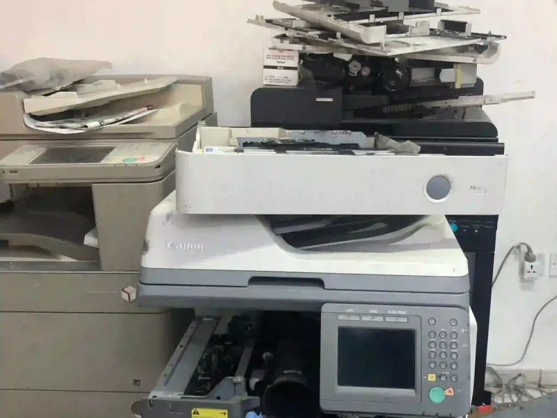 Professional printer repair service technician fixing an office printer in UAE