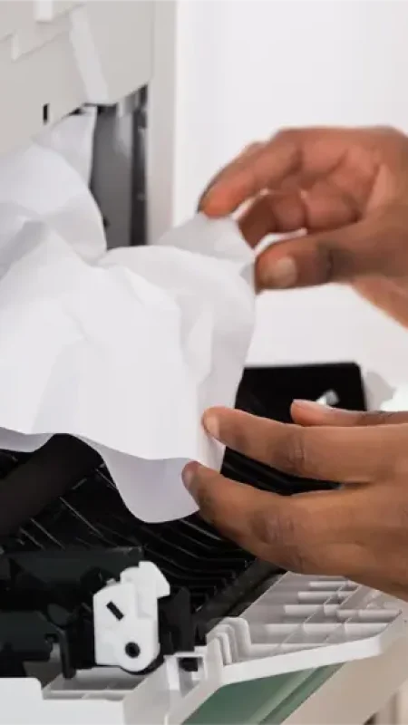 Professional printer repair service technician fixing an office printer in UAE