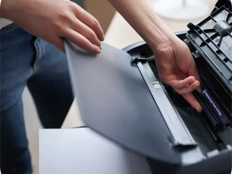 Professional printer repair service technician fixing an office printer in UAE