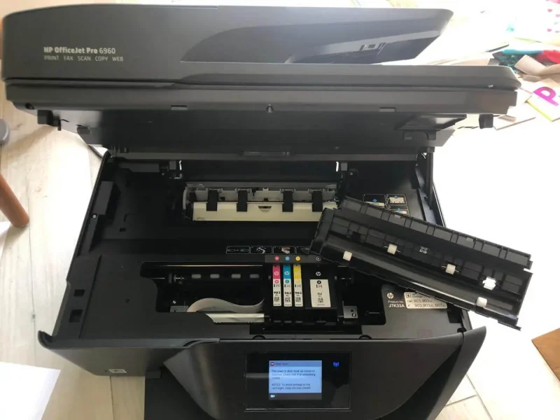 Professional printer repair service technician fixing an office printer in UAE