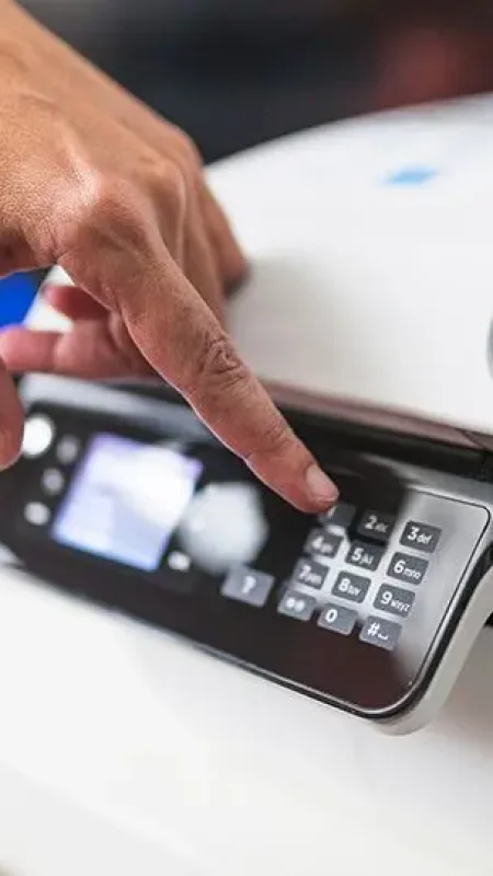 Professional printer repair service technician fixing an office printer in UAE